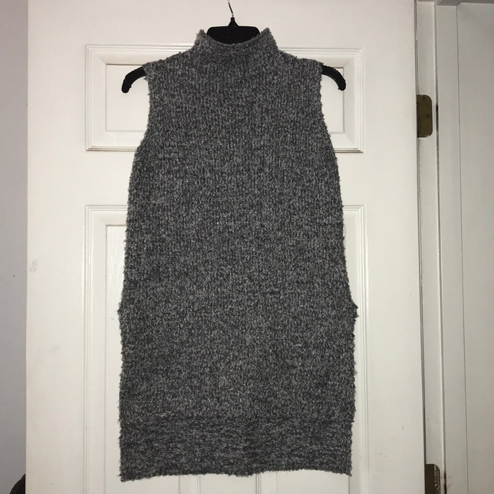 Gray sleeveless turtleneck